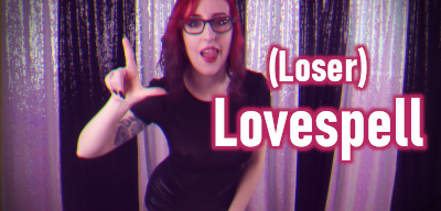 Femdom Findom Goddess Miss Faith Rae flashes you the loser sign with her hand as she looks at you teasingly, her tongue on her teeth. She’s wearing a sheer mesh top with nipple pasties underneath, and wet look short shorts. A subtle glitch filter has been applied to the image. Image is from her beta loser humiliation trance Goddess worship clip, LOSER LOVESPELL. Title text is overlaid on the image. Click here for MP4 Goody Bag LOSER LOVESPELL.